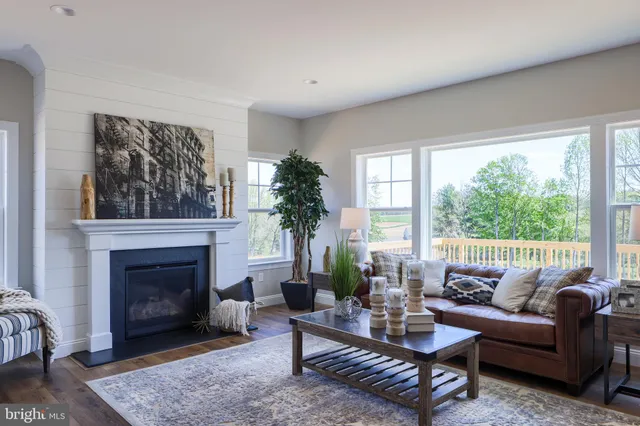 a bedroom with a bed and a chair