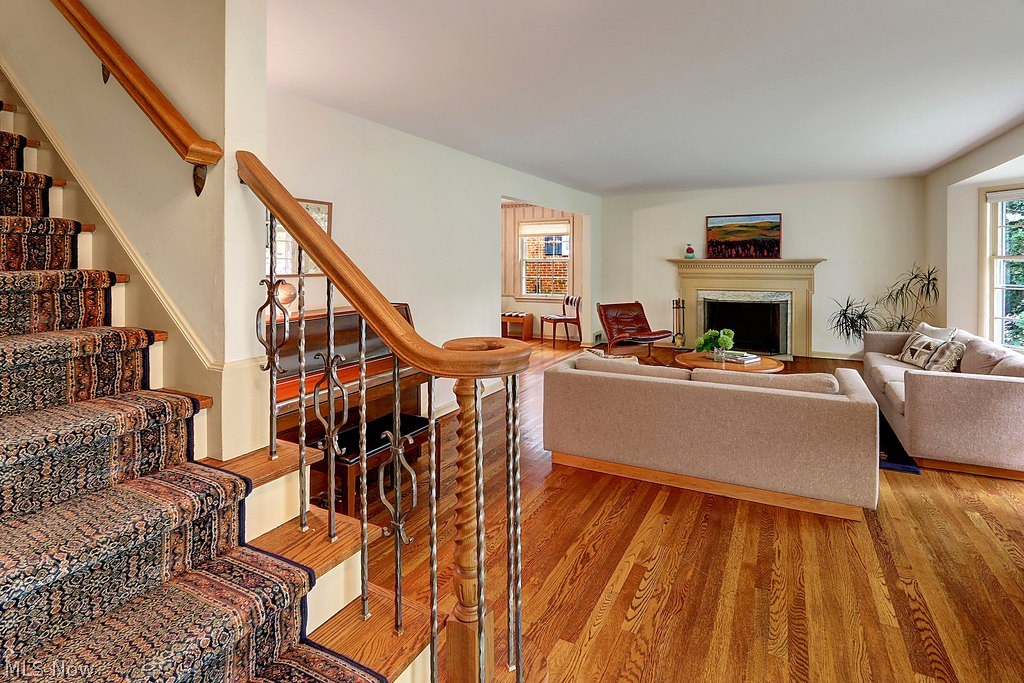 This lovely home has warm wood floors, classic architectural details, inviting spaces.