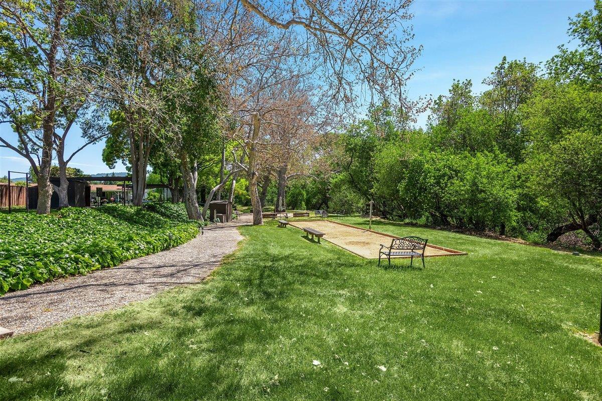 8 Spring Lane, Unit 8 Morgan Hill, CA 95037 - Photo 23 of 23 a view of a swimming pool with a yard