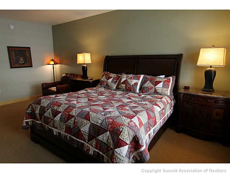 910 Copper Road, Unit 327 Frisco, CO 80443 - Photo 9 of 15 Bedroom. This is the master bedroom of the condo.