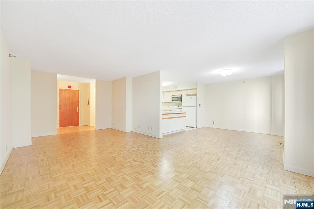 316 Prospect Avenue, Unit 3D Hackensack, NJ 07601 - Photo 12 of 20 an empty room with closet and windows