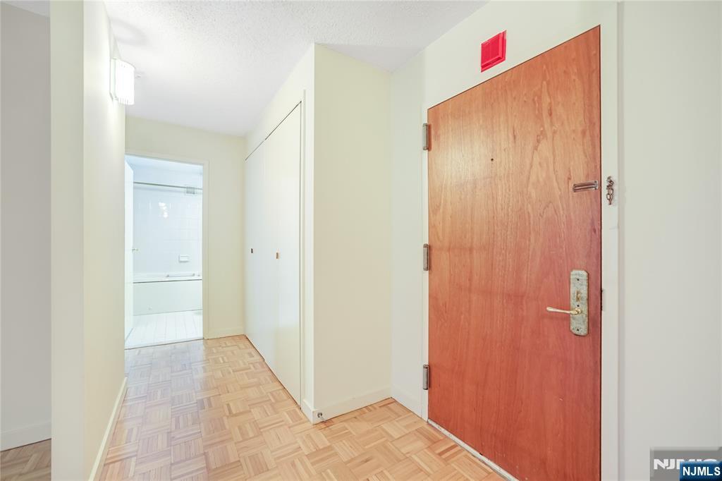 316 Prospect Avenue, Unit 3D Hackensack, NJ 07601 - Photo 9 of 20 a view of a hallway with closet