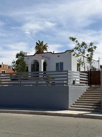 a house view with a garden space