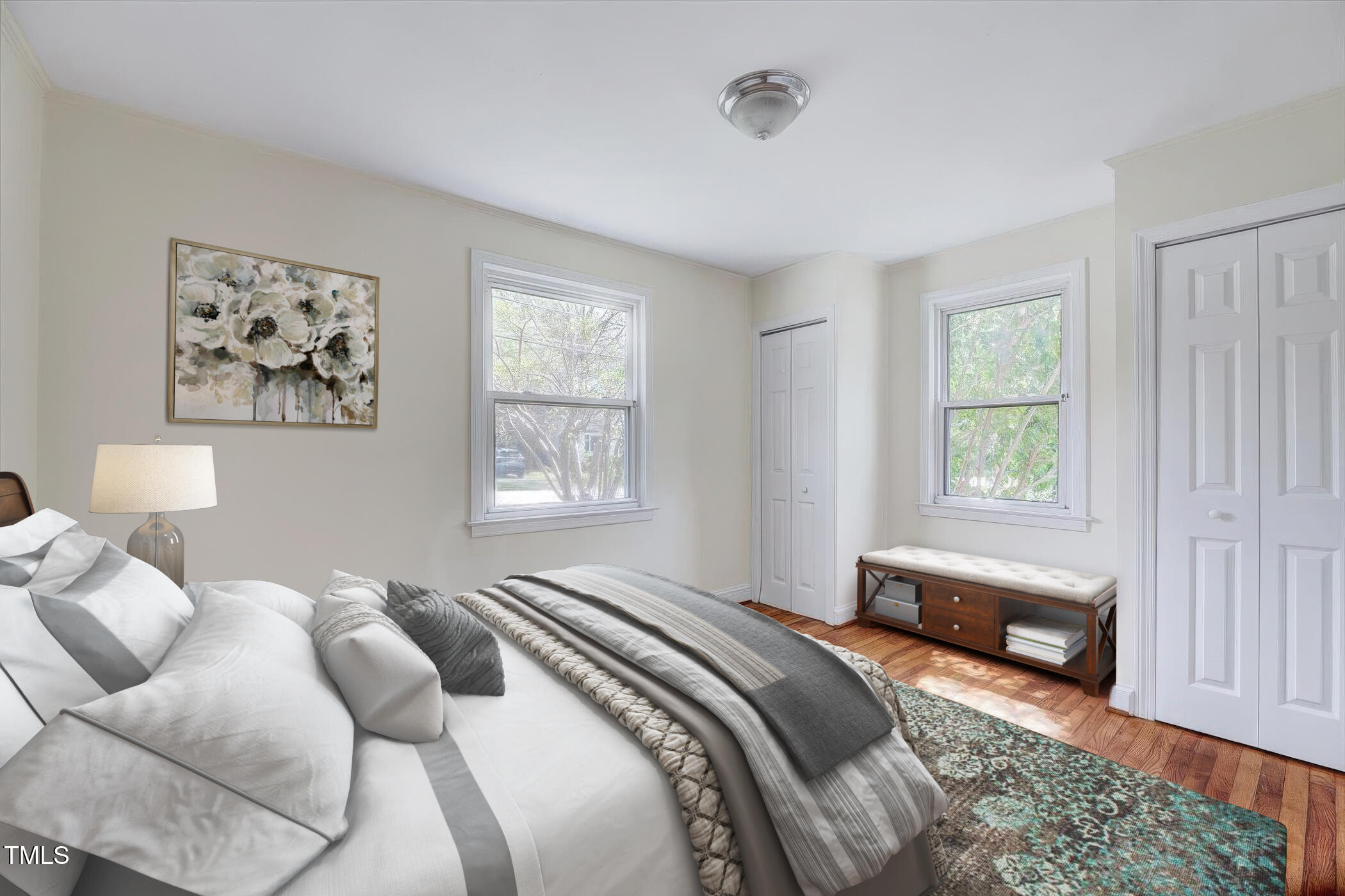 829 Colleton Road Raleigh, NC 27610 - Photo 10 of 27 a bedroom with a bed and a window