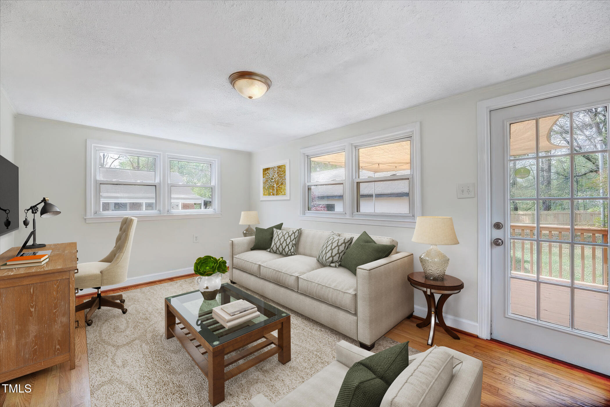 829 Colleton Road Raleigh, NC 27610 - Photo 16 of 27 a living room with furniture and a window