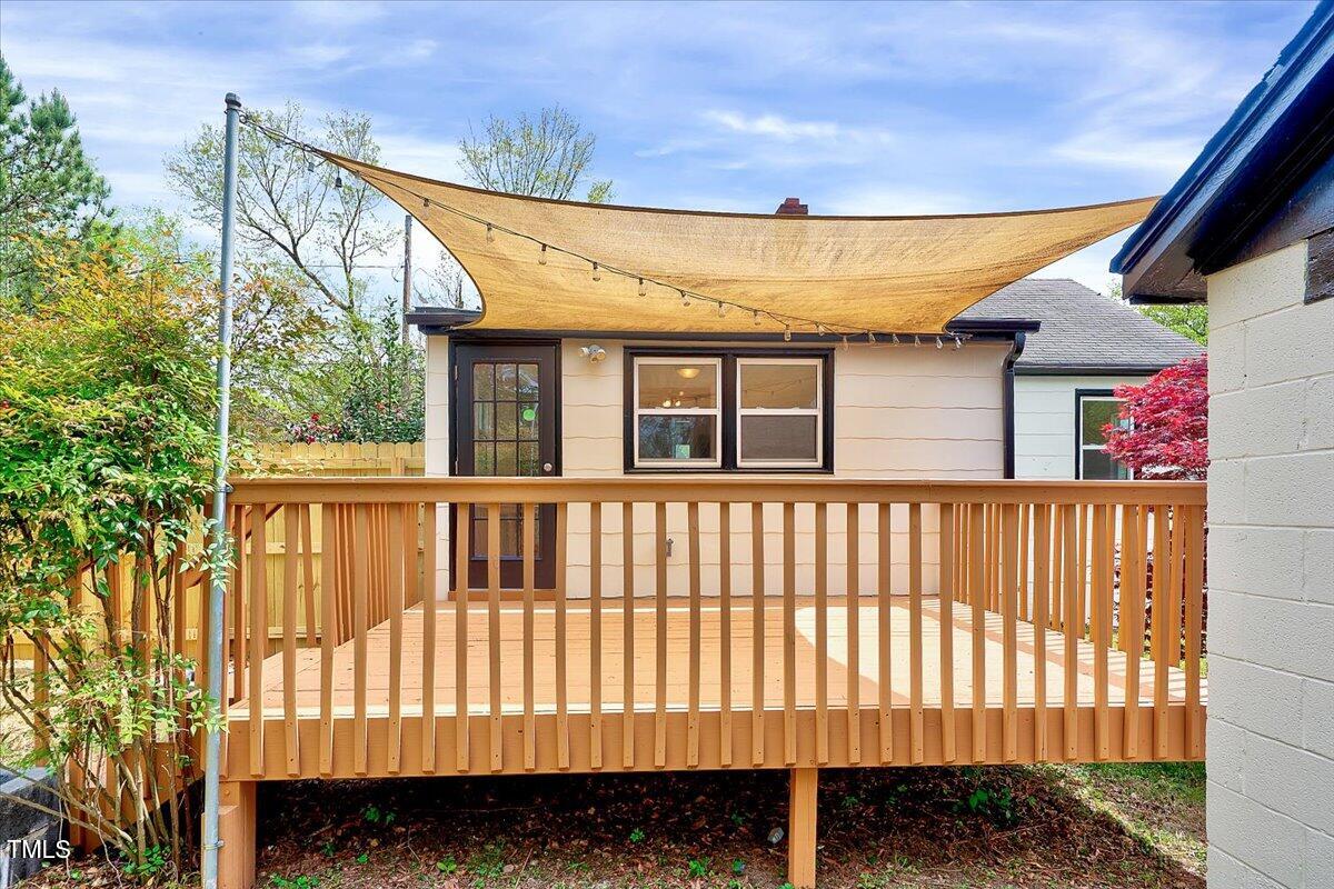 829 Colleton Road Raleigh, NC 27610 - Photo 19 of 27 a view of a brick house with a large window