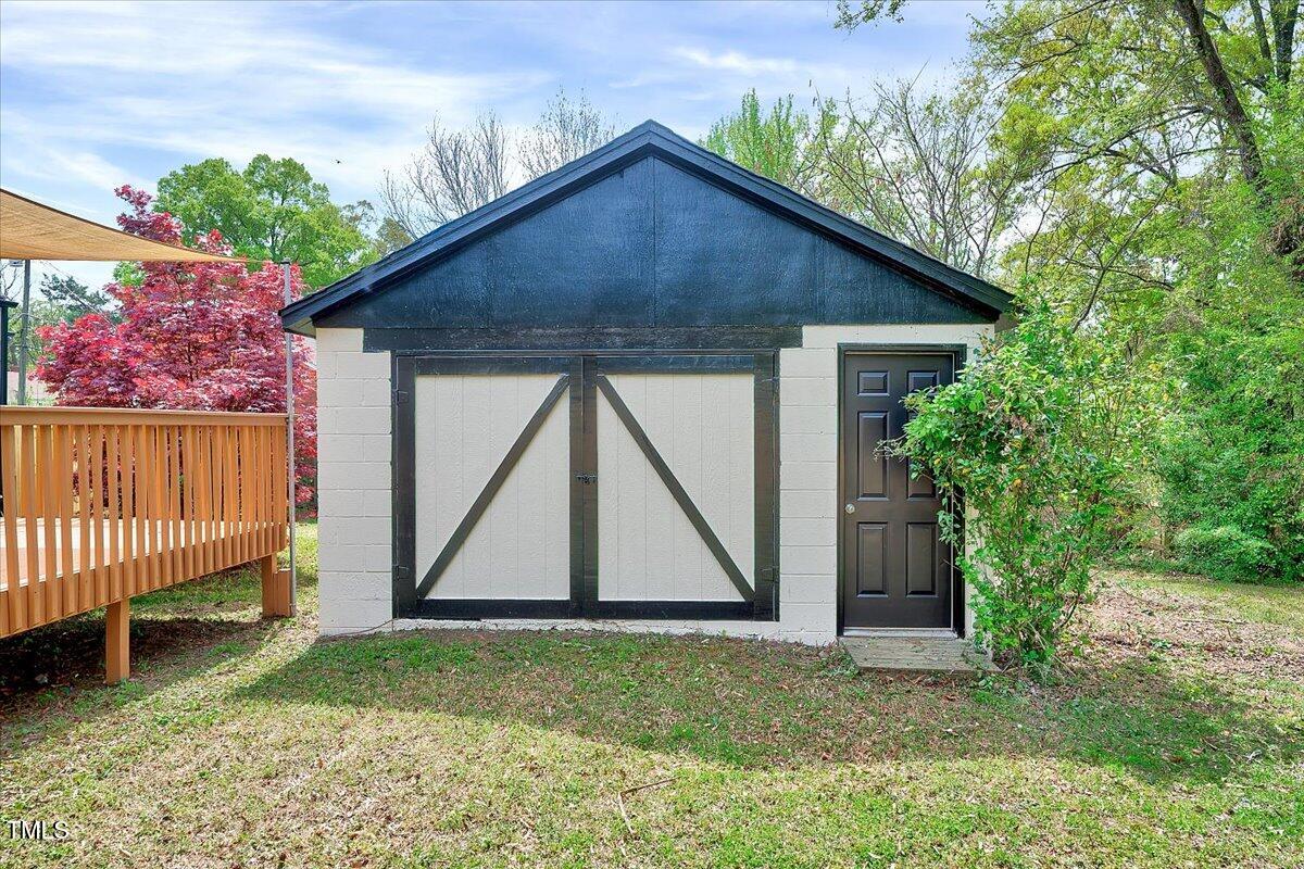 829 Colleton Road Raleigh, NC 27610 - Photo 23 of 27 a house with garden in front of it