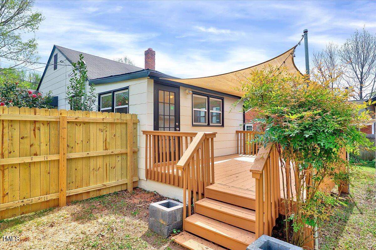 829 Colleton Road Raleigh, NC 27610 - Photo 3 of 27 a view of a house with a wooden fence
