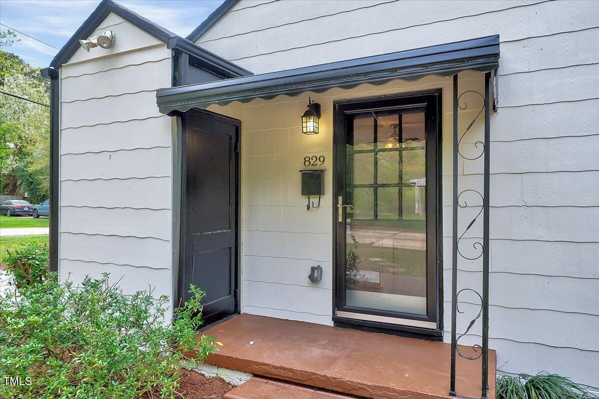 829 Colleton Road Raleigh, NC 27610 - Photo 4 of 27 a view of front door and porch