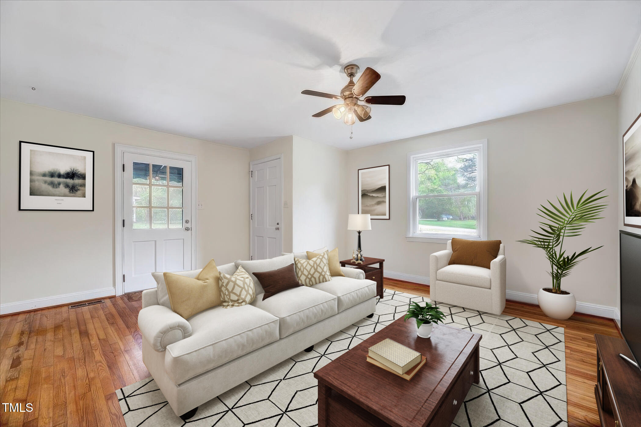 829 Colleton Road Raleigh, NC 27610 - Photo 6 of 27 a living room with furniture and a window