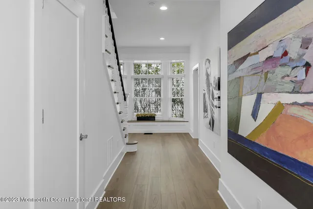 a view of entryway with wooden floor