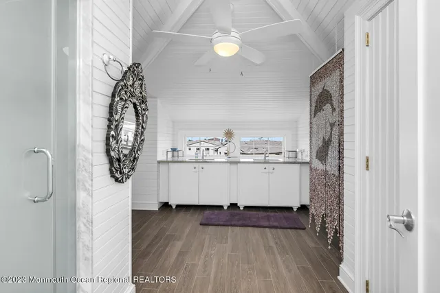 a view of entryway with wooden floor
