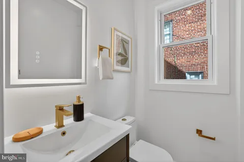 a bathroom with a sink and a toilet
