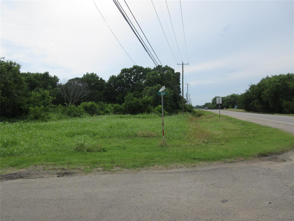 0 South Oak Street Ector, TX 75439 - Photo 1 of 11 View of asphalt road with traffic signs