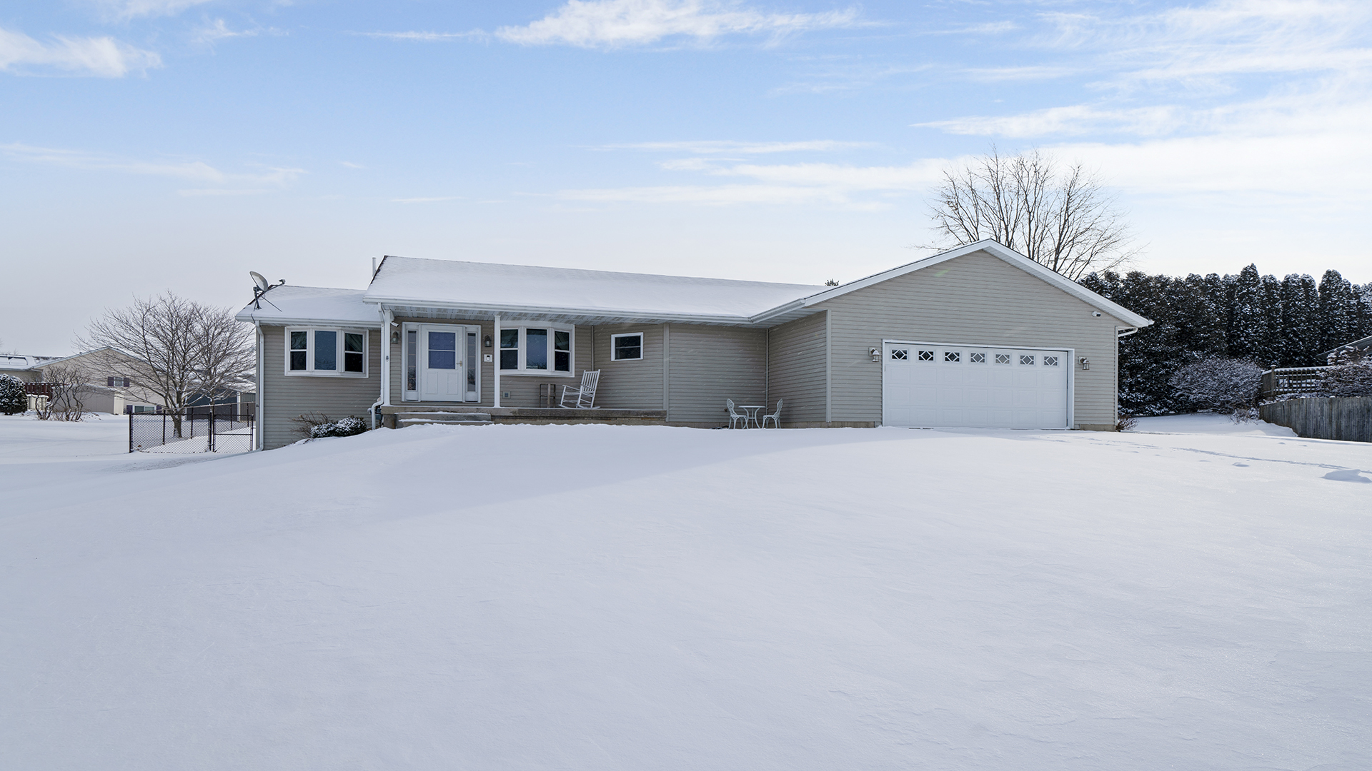 108 Miller Court Davis, IL 61019 - Photo 1 of 28 a front view of a house with a yard and garage