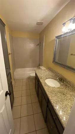 a bathroom with a sink and a toilet
