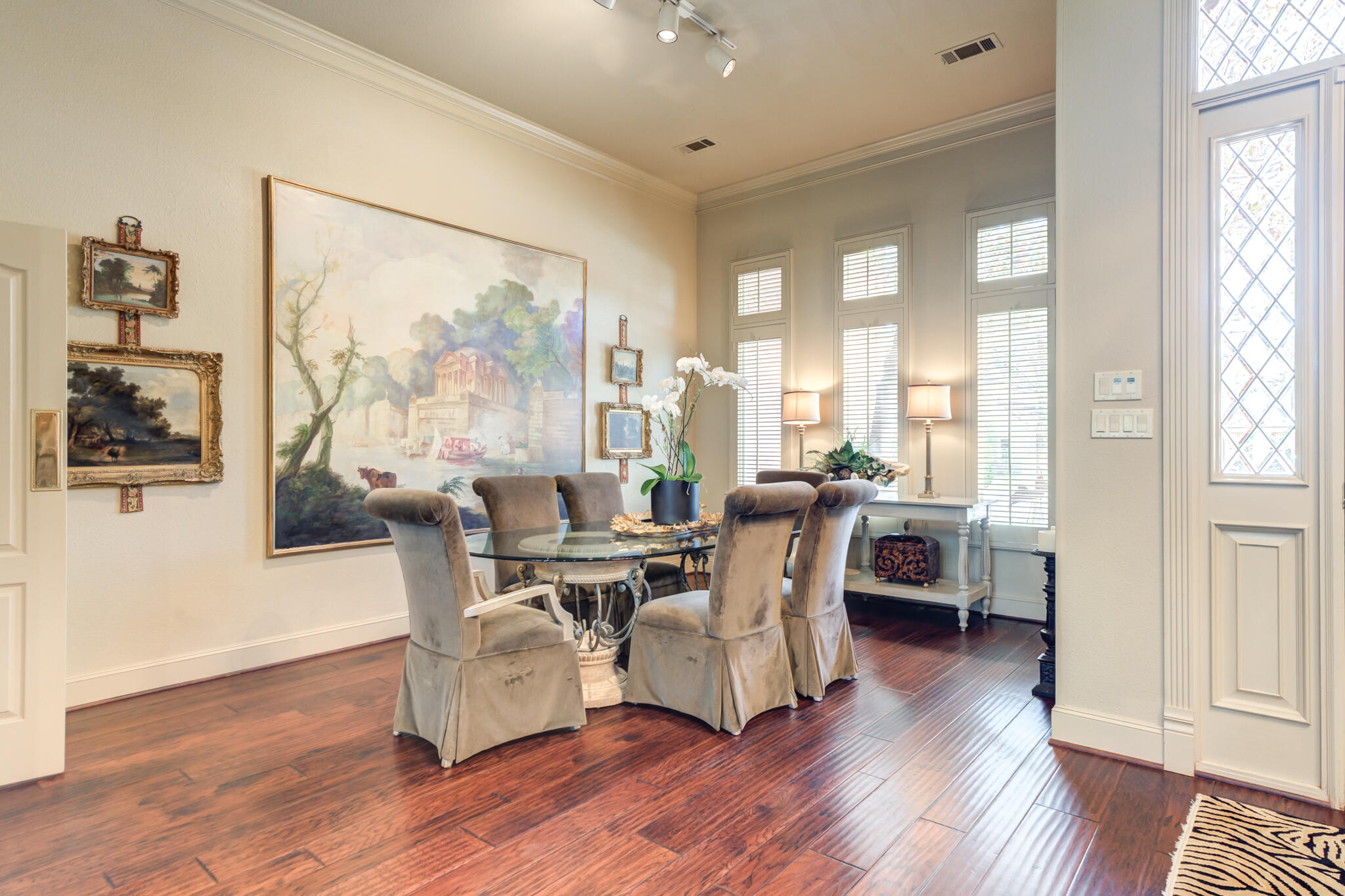4612 91st Street Lubbock, TX 79424 - Photo 12 of 83 a living room with furniture and wooden floor