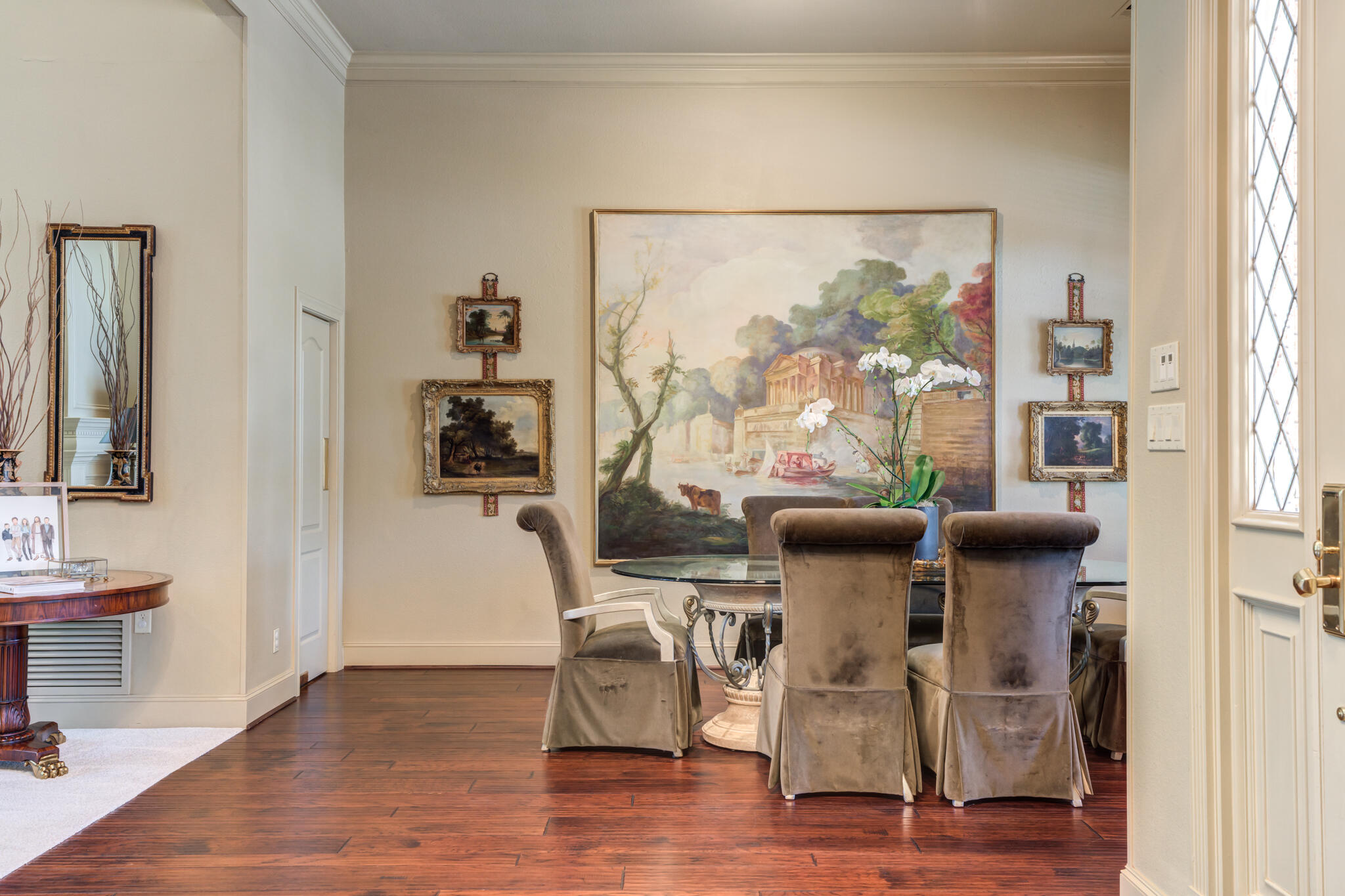 4612 91st Street Lubbock, TX 79424 - Photo 17 of 83 a view of a dining room with furniture and wooden floor