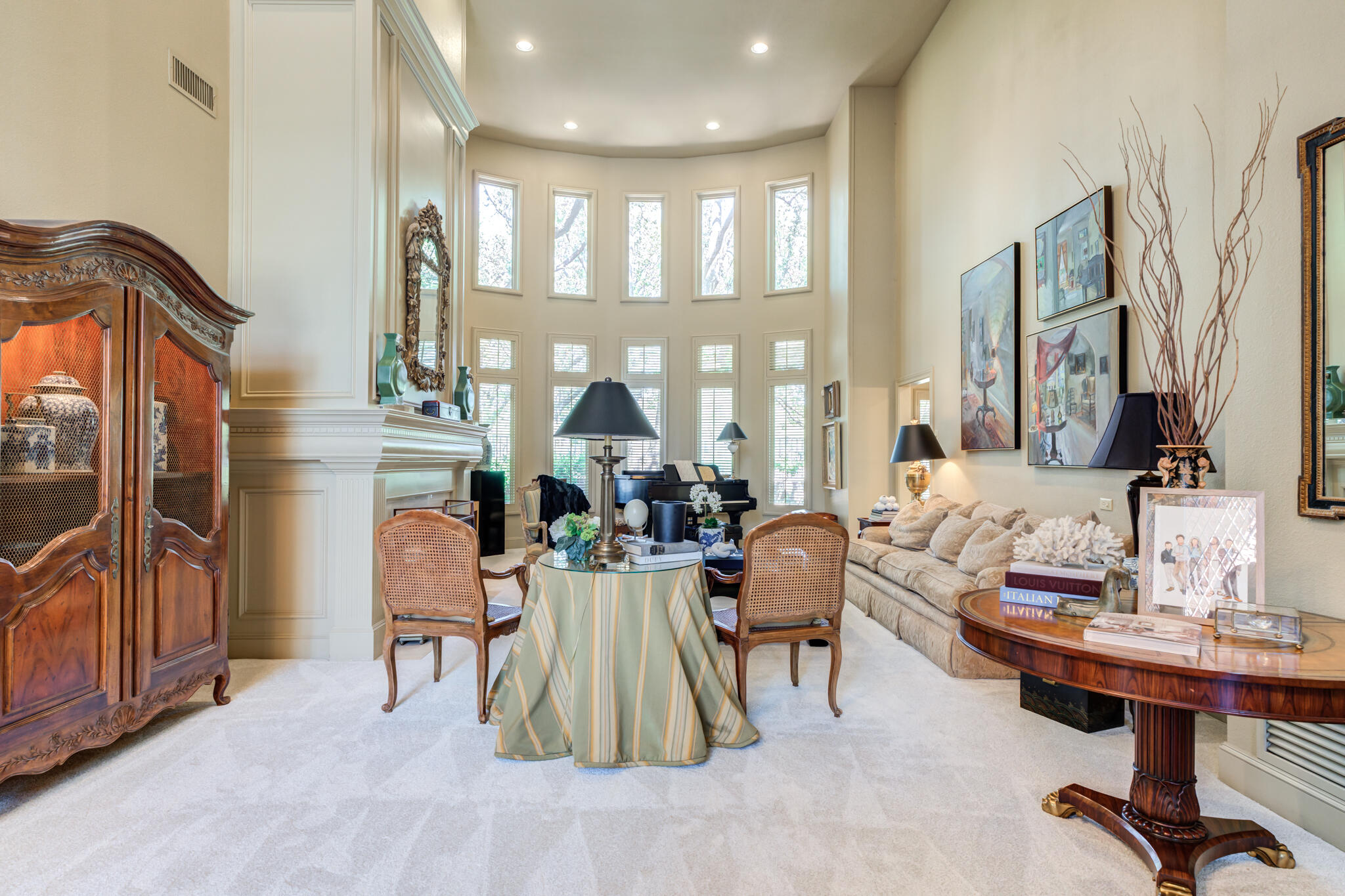4612 91st Street Lubbock, TX 79424 - Photo 18 of 83 a living room with fireplace furniture and a flat screen tv