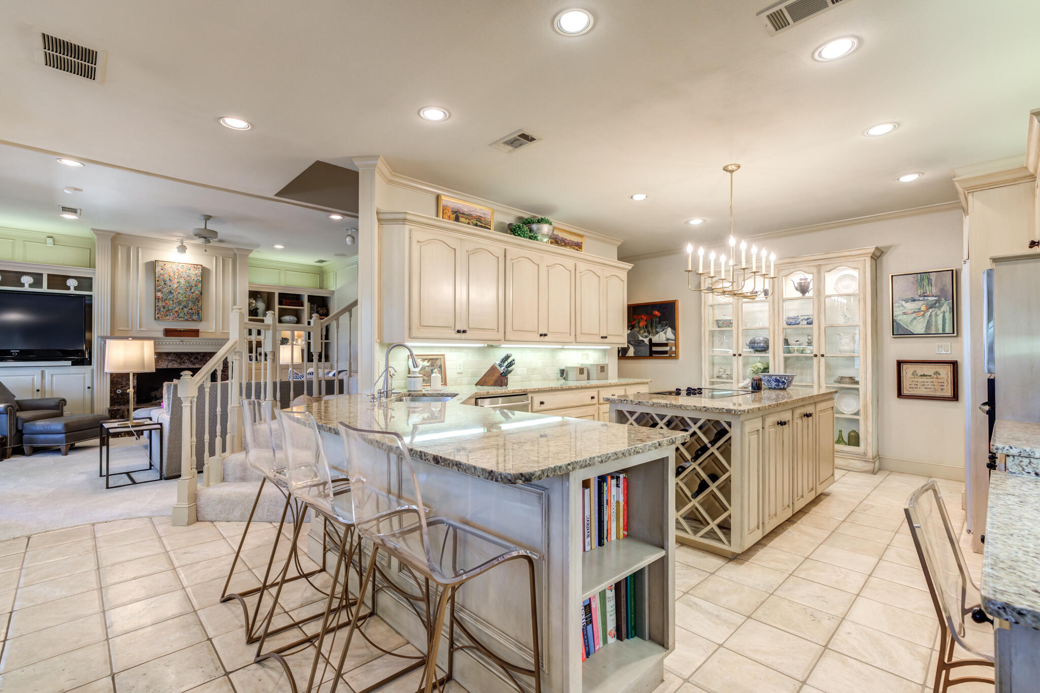 4612 91st Street Lubbock, TX 79424 - Photo 37 of 83 a kitchen with stainless steel appliances kitchen island granite countertop a sink and cabinets