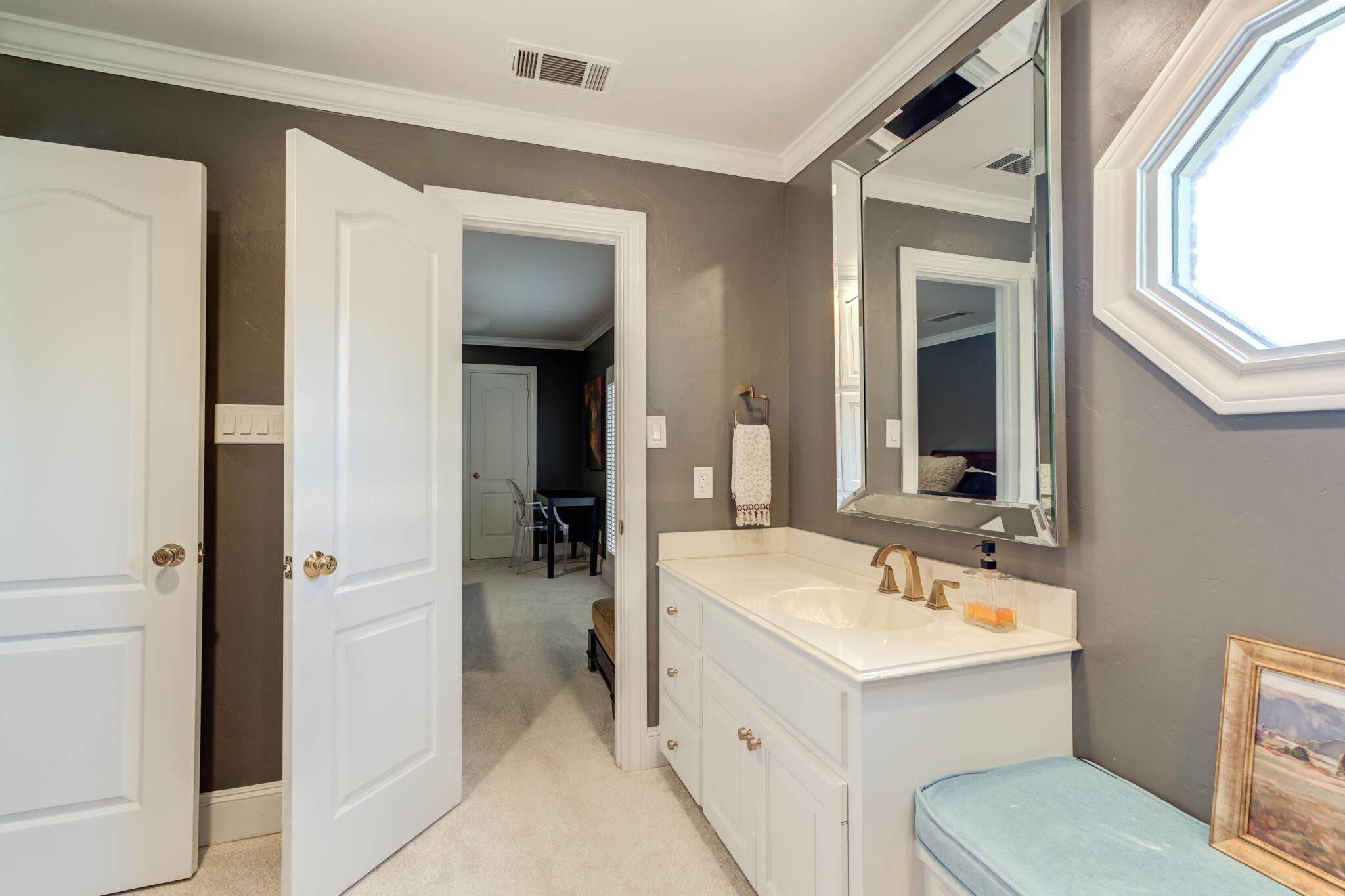 4612 91st Street Lubbock, TX 79424 - Photo 67 of 83 a bathroom with a sink double vanity and a mirror