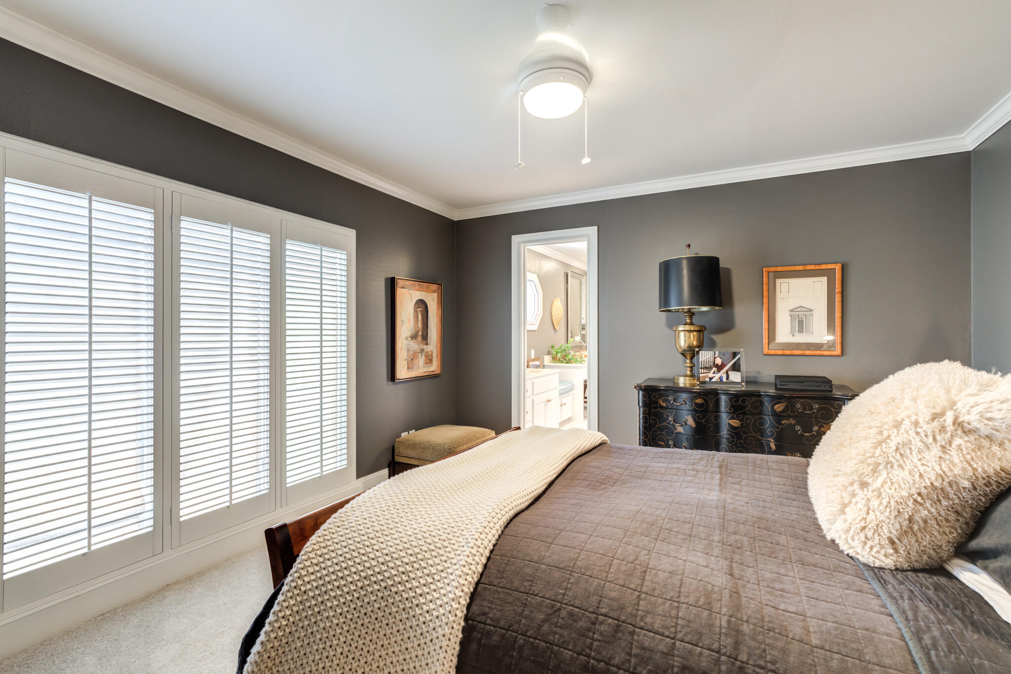 4612 91st Street Lubbock, TX 79424 - Photo 69 of 83 a bedroom with a large bed and a flat screen tv