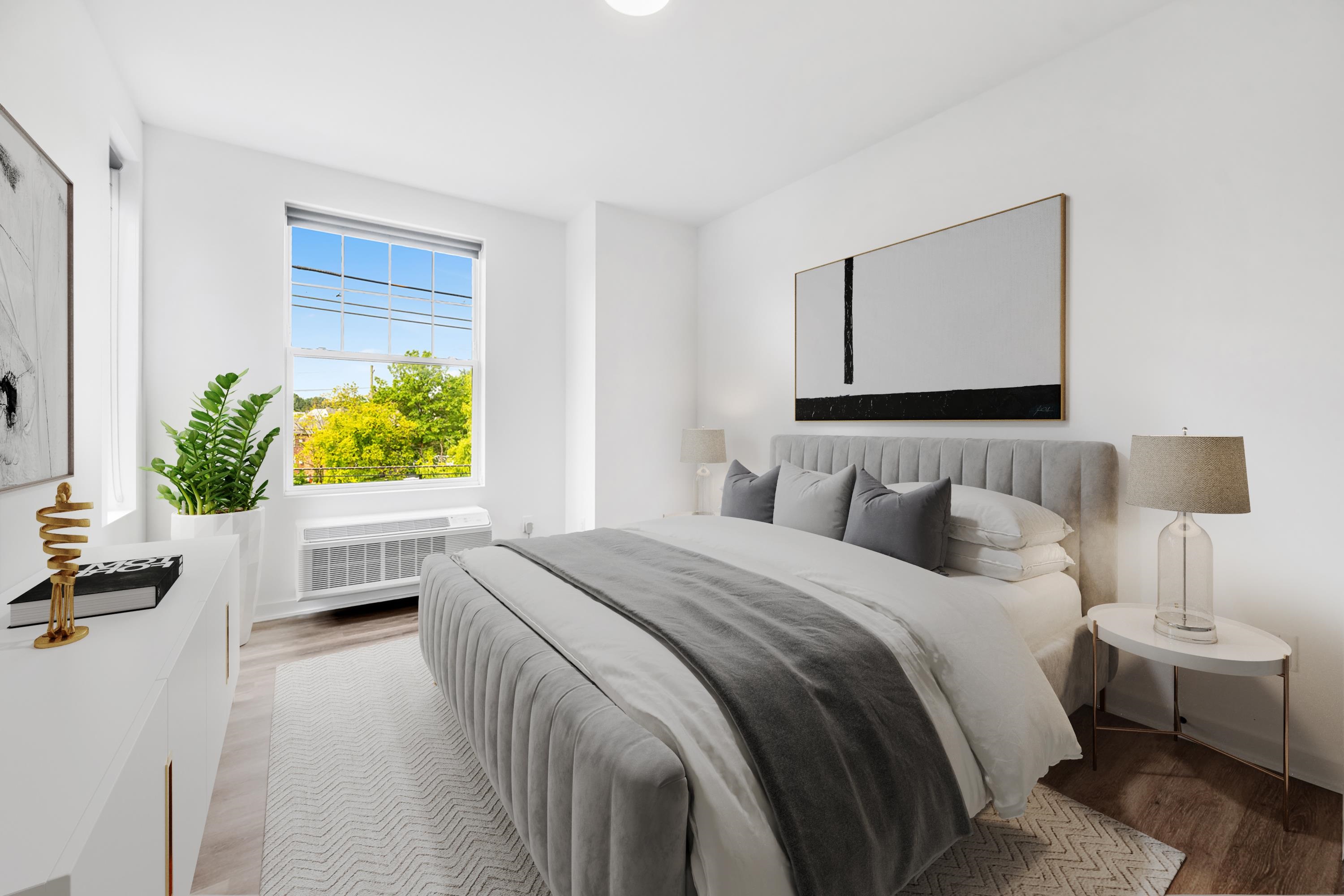 315 Railroad Avenue, Unit 204 East Rutherford, NJ 07073 - Photo 15 of 29 a bedroom with a bed and a window