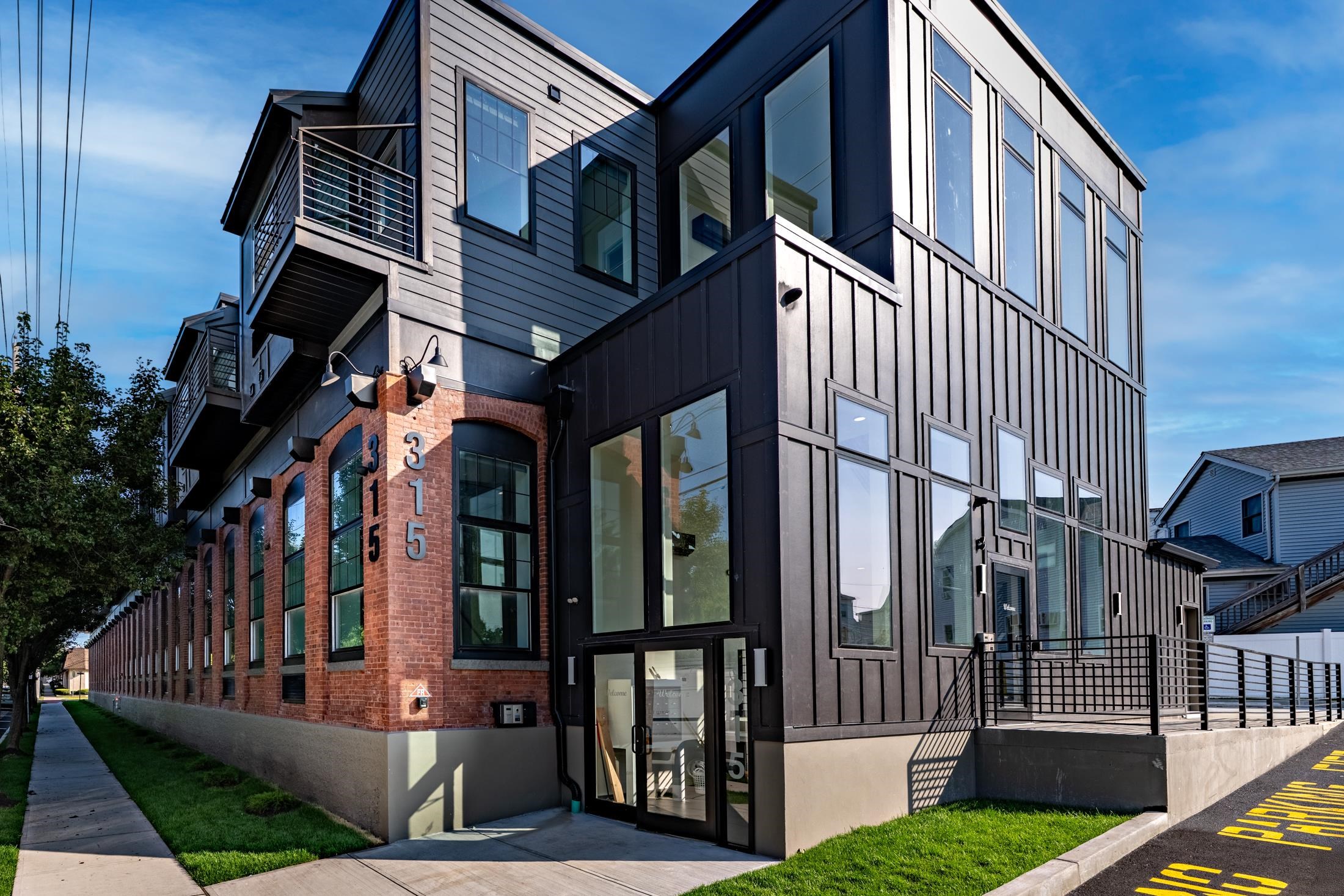 315 Railroad Avenue, Unit 204 East Rutherford, NJ 07073 - Photo 26 of 29 a view of a building on the deck