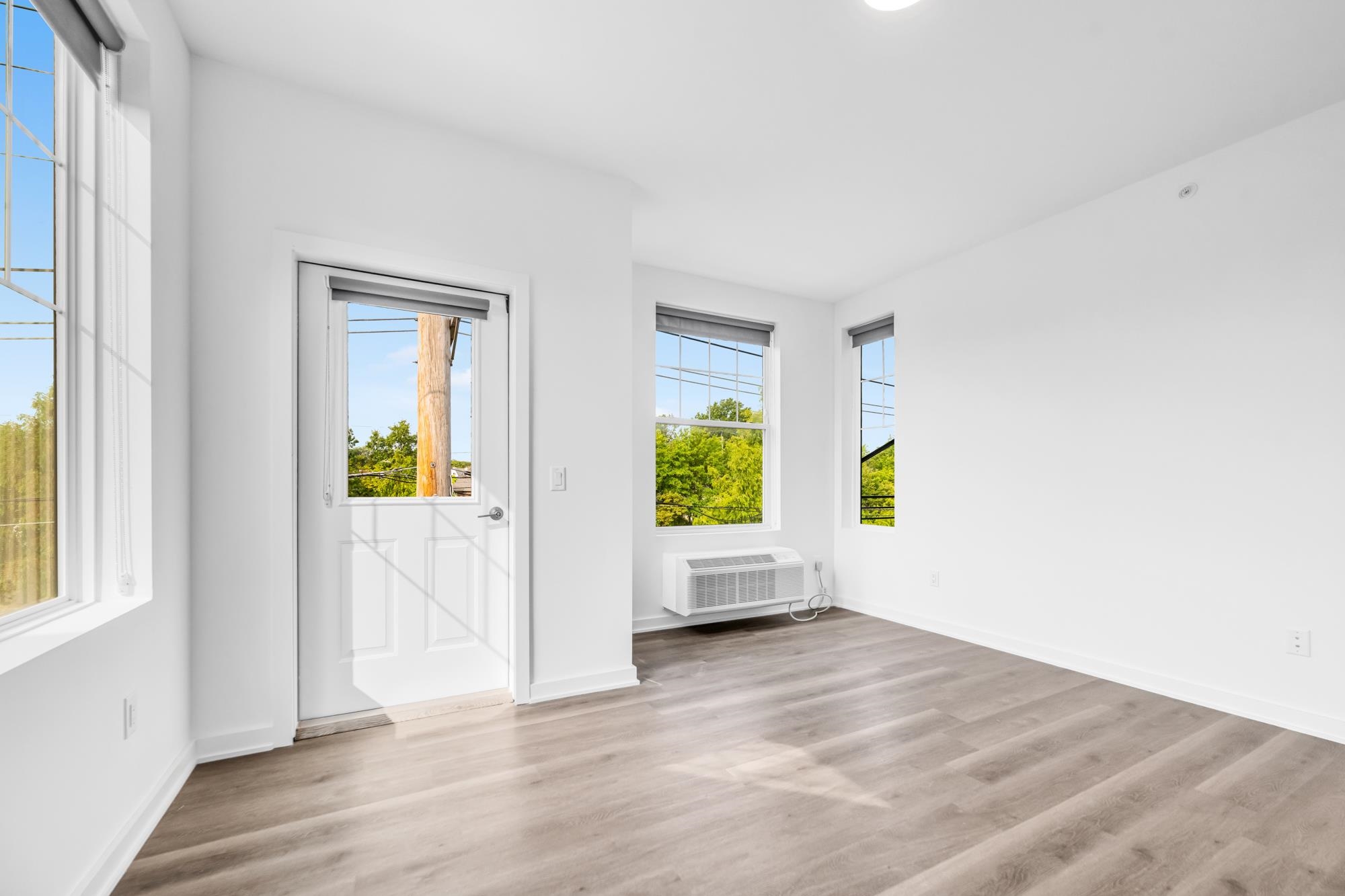 315 Railroad Avenue, Unit 204 East Rutherford, NJ 07073 - Photo 10 of 29 a view of an empty room and window