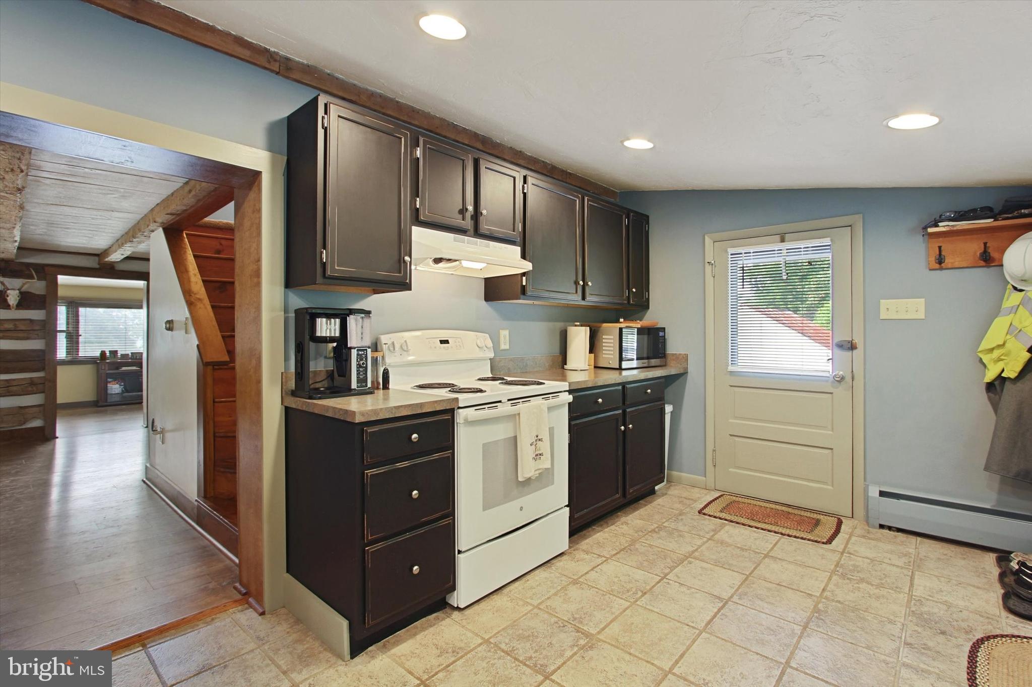 184 Three Hill Road Spring Grove, PA 17362 - Photo 4 of 29 a kitchen with a cabinets and wooden floor