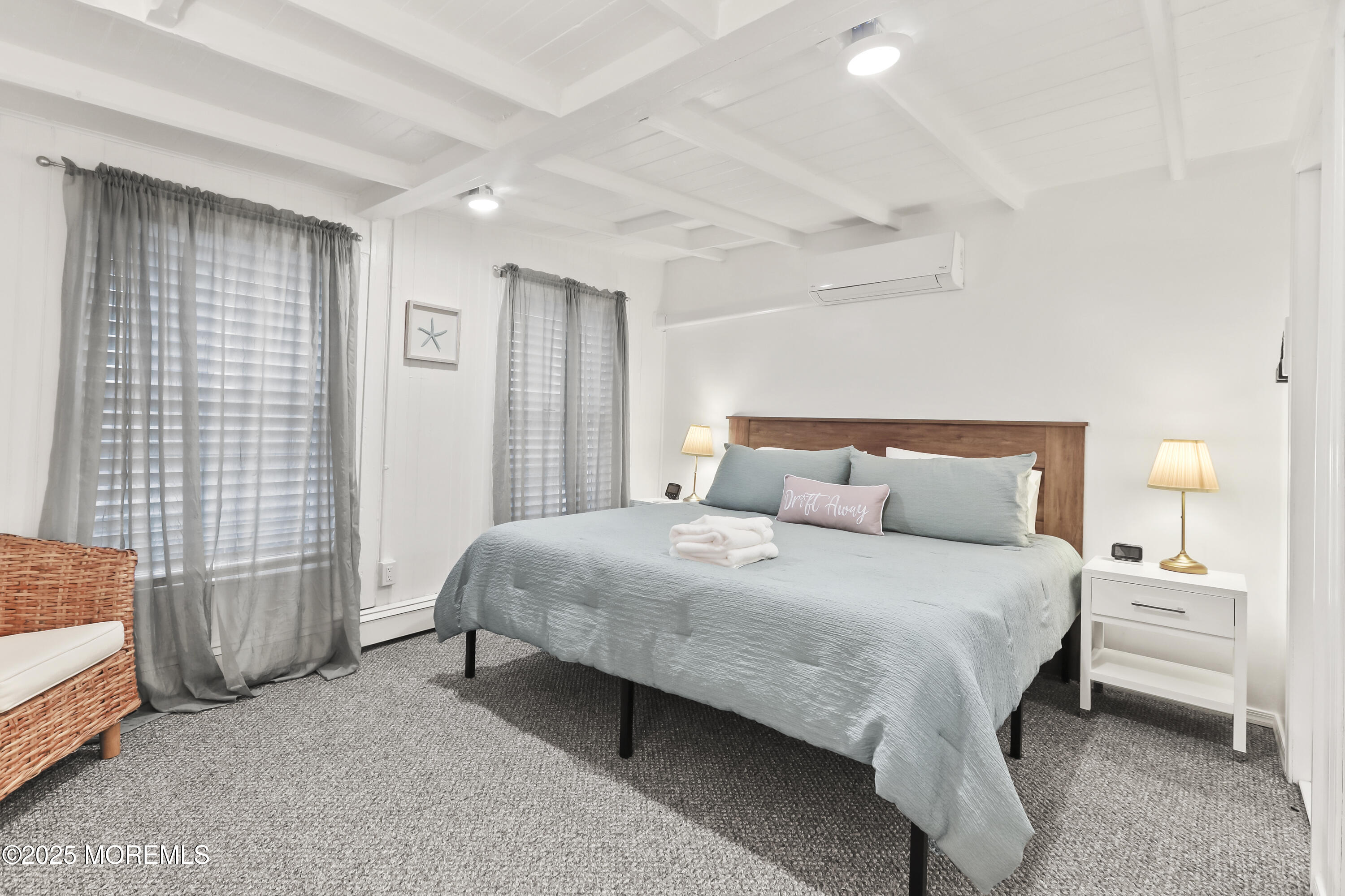 9 Pitman Avenue Ocean Grove, NJ 07756 - Photo 12 of 41 a bedroom with a bed and a lamp