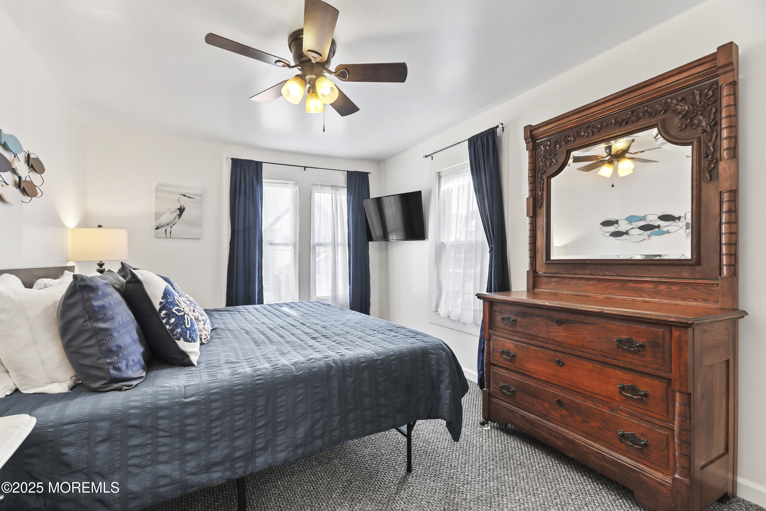 9 Pitman Avenue Ocean Grove, NJ 07756 - Photo 33 of 41 a bedroom with a bed and a flat screen tv