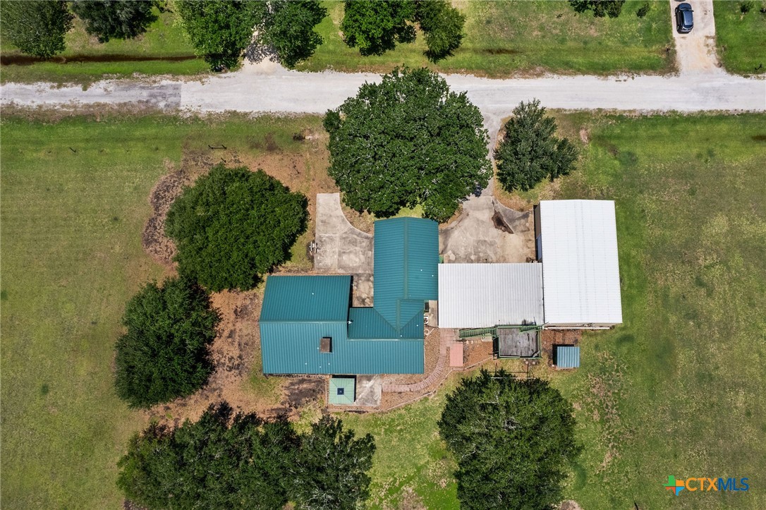 181 Pecan Street Port Lavaca, TX 77979 - Photo 34 of 34 an aerial view of a house with a lake view