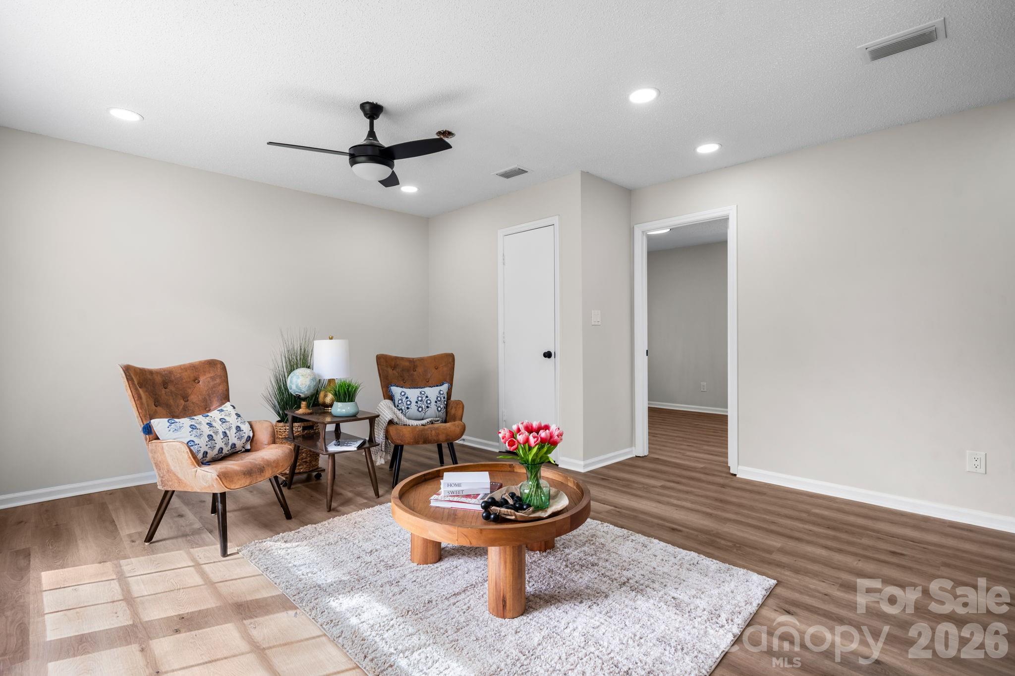1307 6th Avenue Northwest Conover, NC 28613 - Photo 7 of 17 a living room with furniture and white walls
