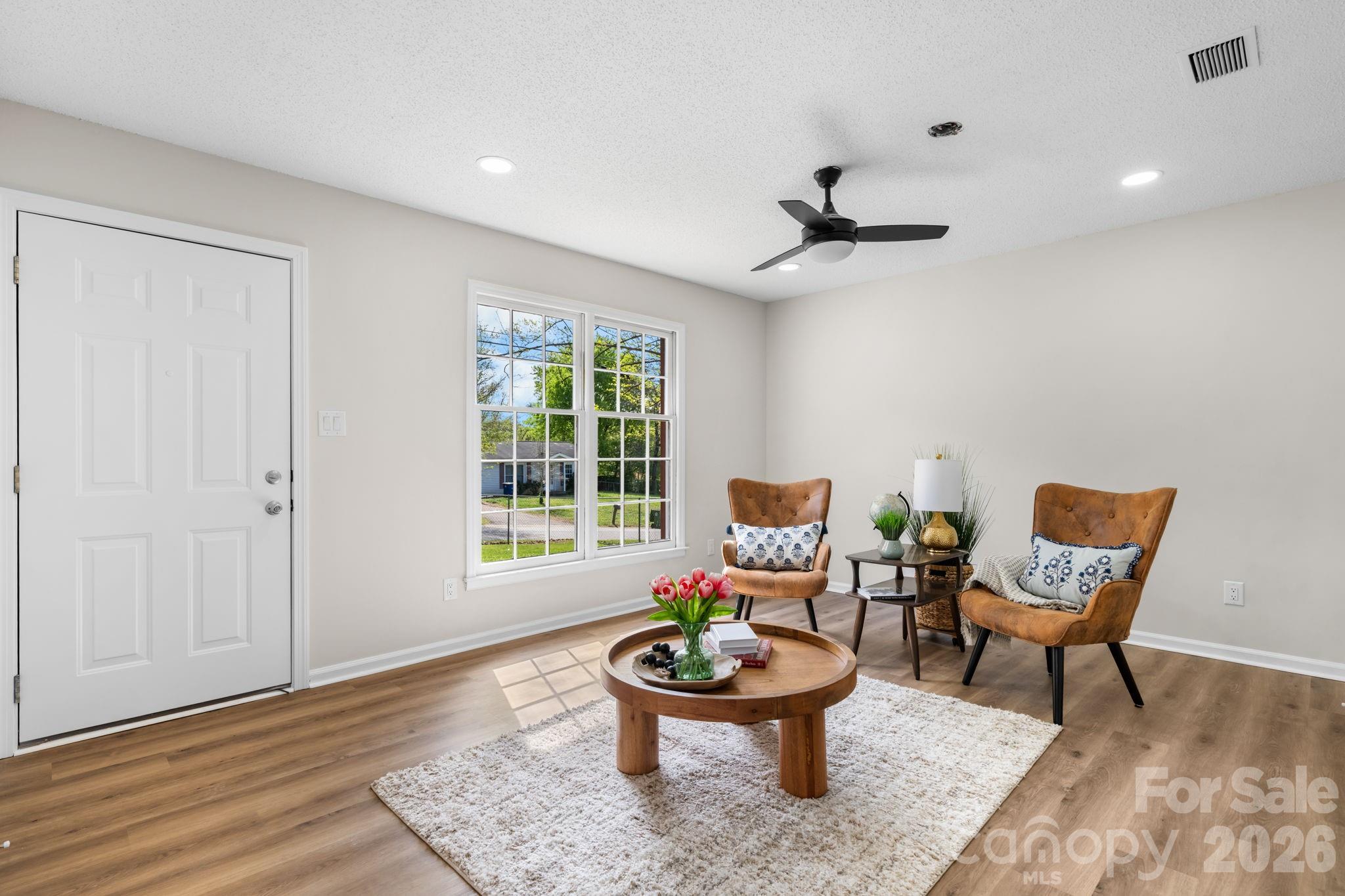 1307 6th Avenue Northwest Conover, NC 28613 - Photo 9 of 17 a living room with furniture and a window