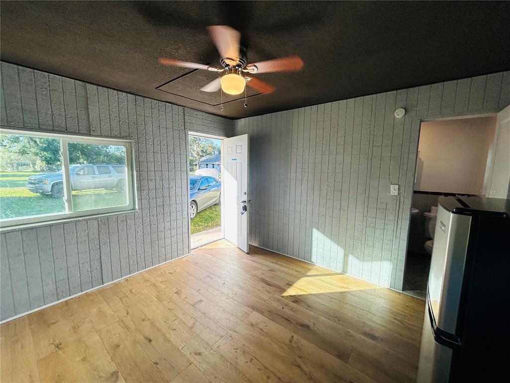 8010 Southeast Us Highway Hawthorne, FL 32640 - Photo 9 of 22 a view of an empty room with a window