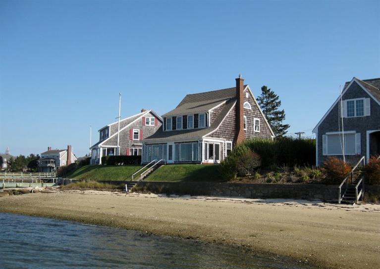 41 Benedict Road Bourne, MA 02532 - Photo 1 of 22 a front view of a house with a yard