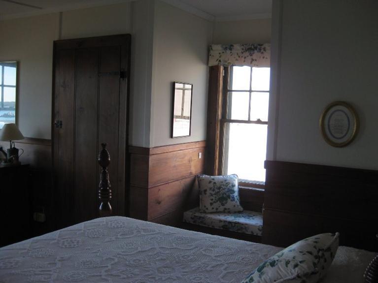 41 Benedict Road Bourne, MA 02532 - Photo 16 of 22 a bedroom with a bed and a window