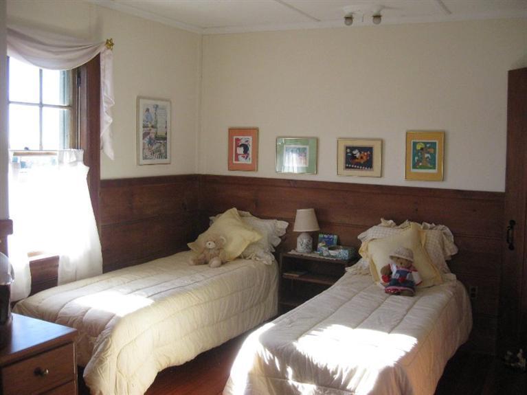 41 Benedict Road Bourne, MA 02532 - Photo 18 of 22 a bedroom with bed and a window