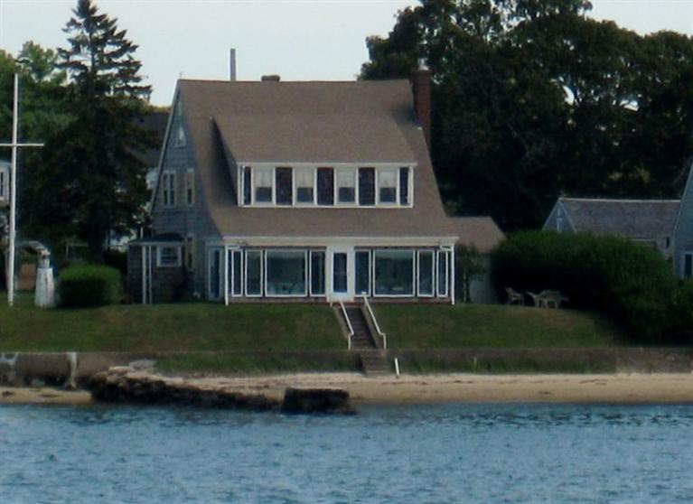 41 Benedict Road Bourne, MA 02532 - Photo 2 of 22 a front view of a house with a garden