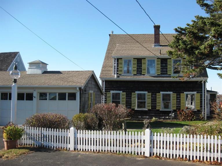 41 Benedict Road Bourne, MA 02532 - Photo 21 of 22 a house that has a lot of windows