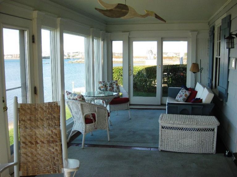 41 Benedict Road Bourne, MA 02532 - Photo 6 of 22 a living room with furniture and a floor to ceiling window