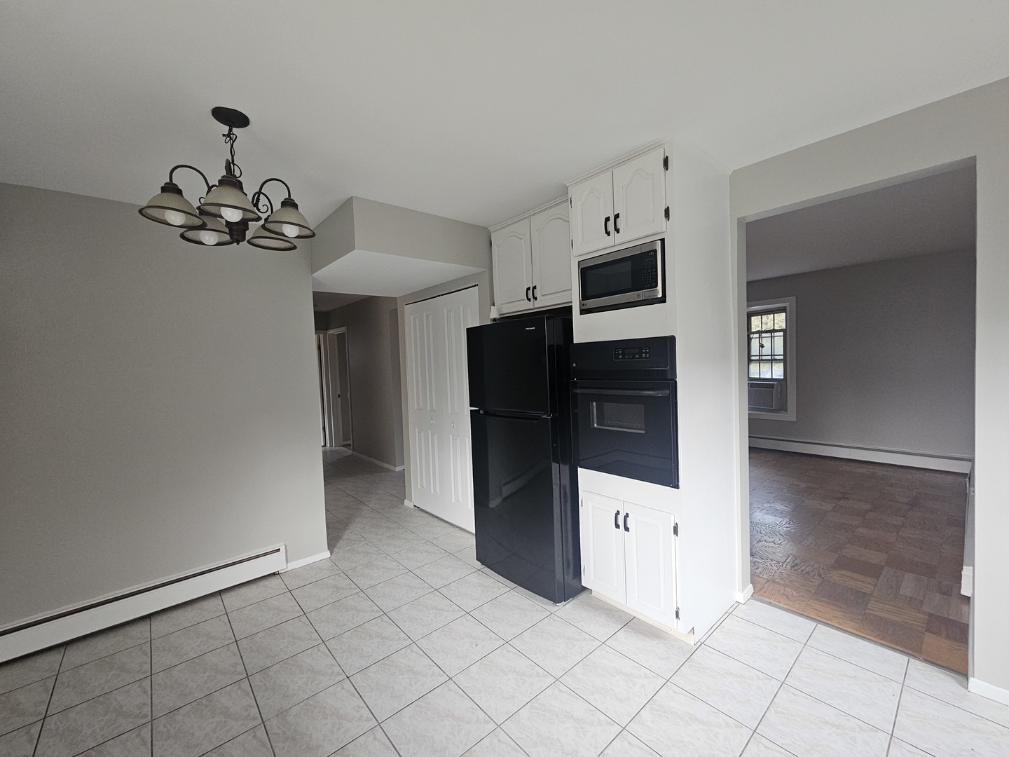 863 North Northwest Highway, Unit 1 Park Ridge, IL 60068 - Photo 12 of 21 a kitchen with stainless steel appliances a refrigerator and a stove