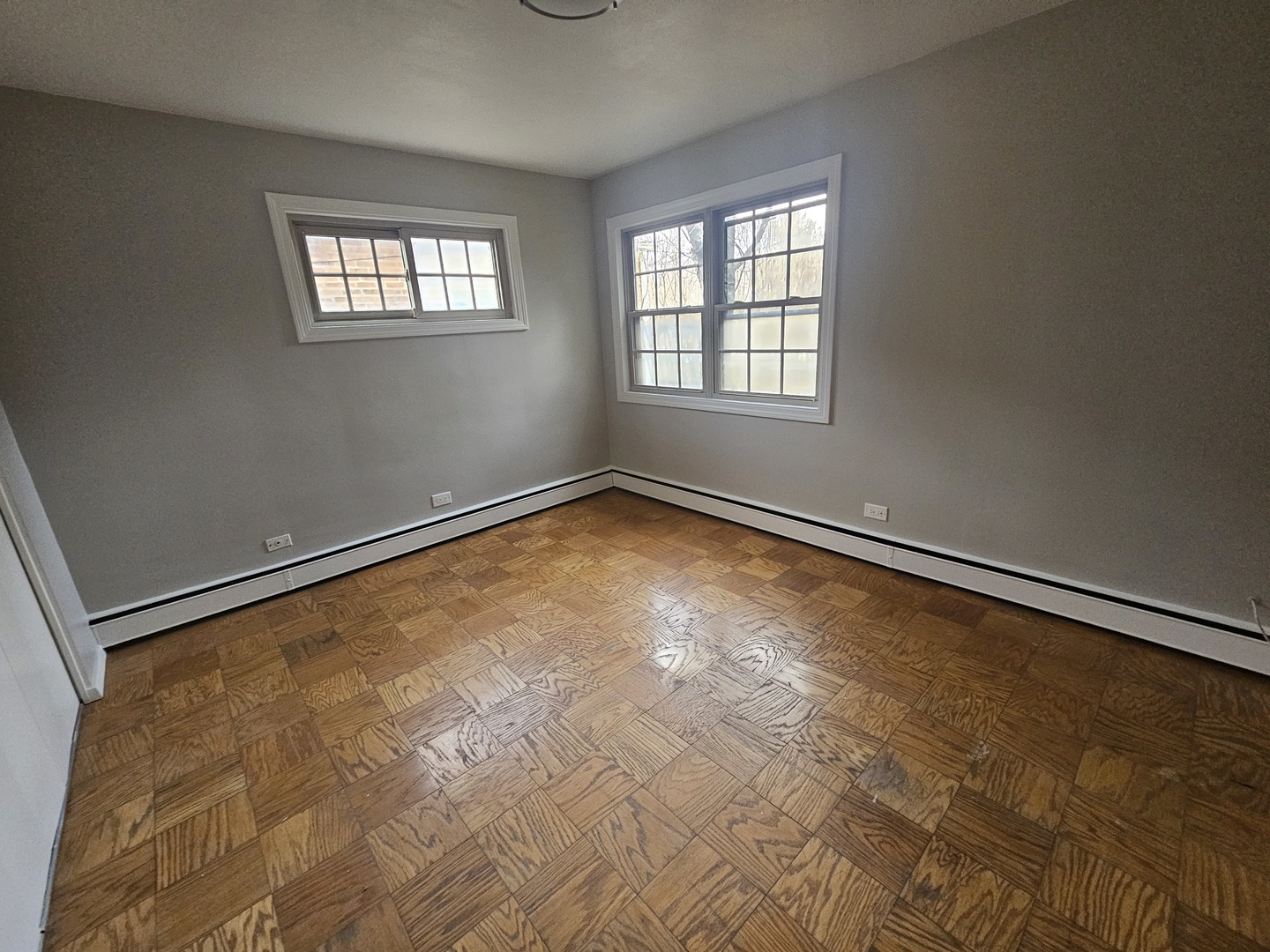 863 North Northwest Highway, Unit 1 Park Ridge, IL 60068 - Photo 8 of 21 an empty room with windows