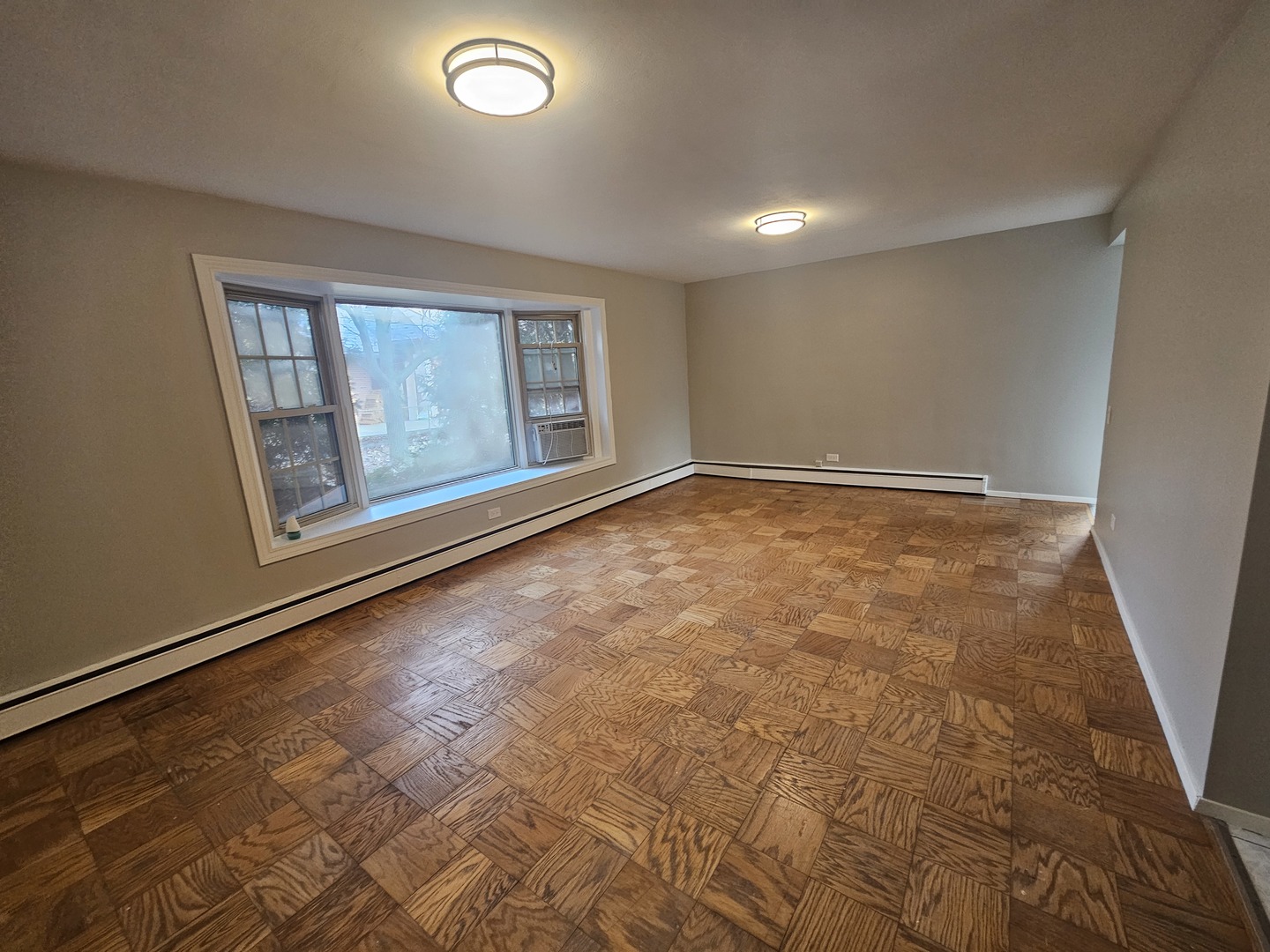 863 North Northwest Highway, Unit 1 Park Ridge, IL 60068 - Photo 9 of 21 an empty room with windows