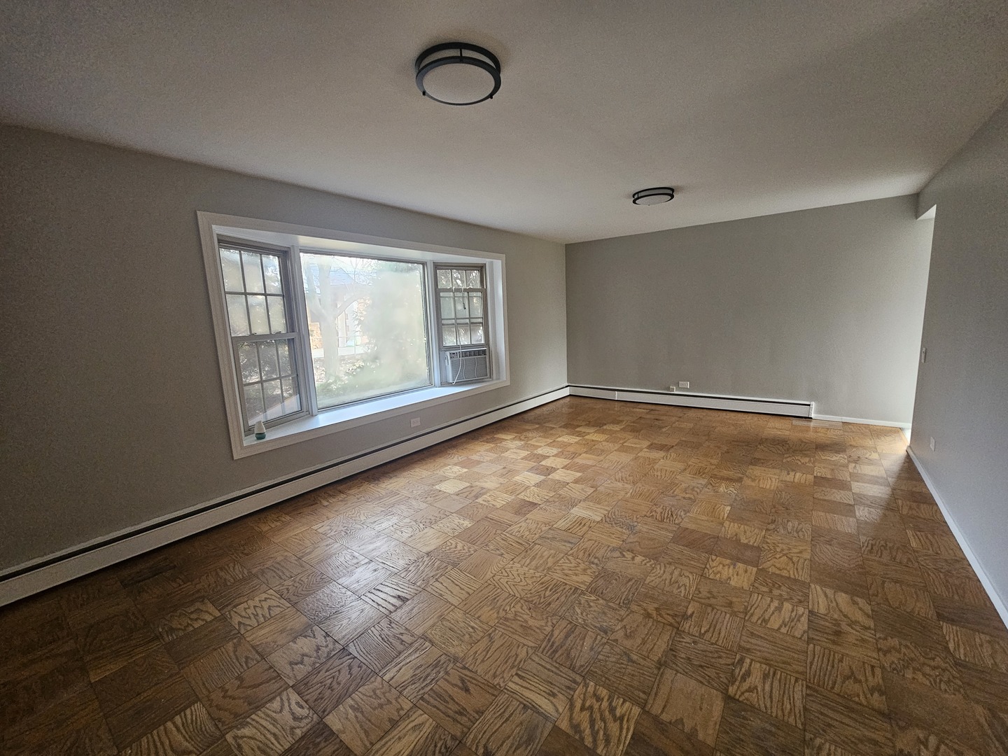 863 North Northwest Highway, Unit 1 Park Ridge, IL 60068 - Photo 10 of 21 an empty room with windows