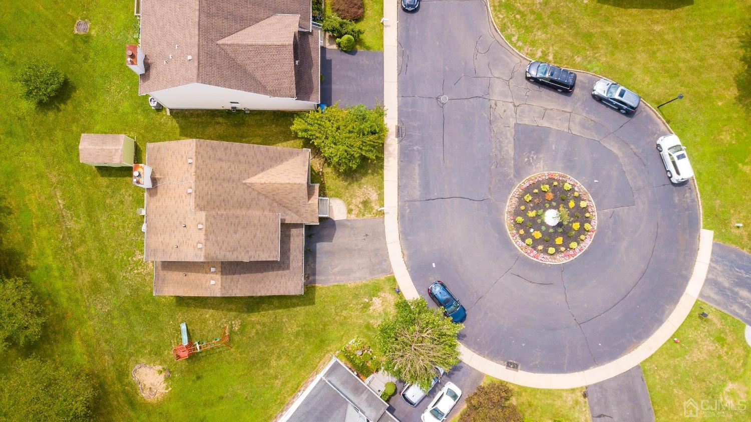 63 Springfield Road North Brunswick, NJ 08902 - Photo 36 of 42 an aerial view of a house with swimming pool and front view of a house