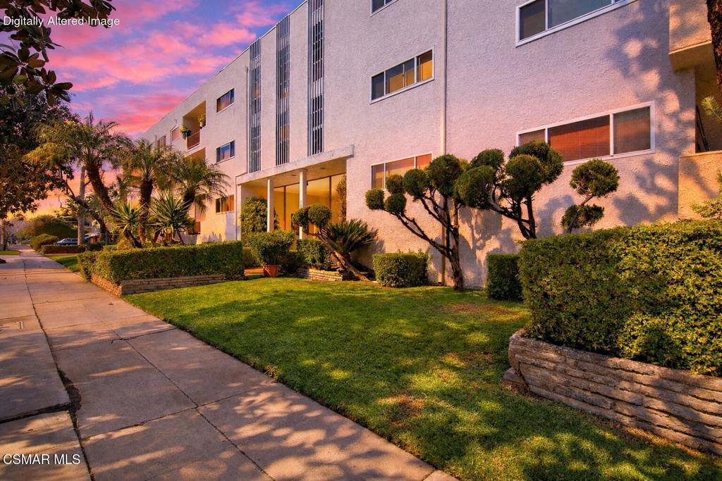 12955 Riverside Drive, Unit 307 Sherman Oaks, CA 91423 - Photo 1 of 24 a view of a street with a building in the background