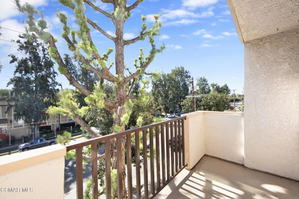12955 Riverside Drive, Unit 307 Sherman Oaks, CA 91423 - Photo 19 of 24 a view of a balcony with trees