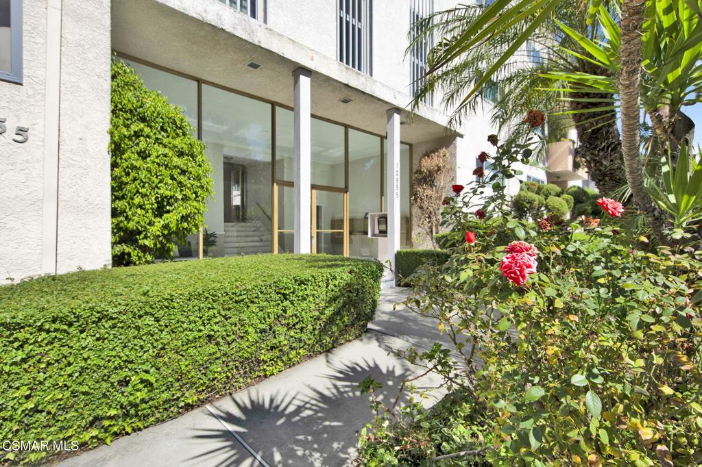 12955 Riverside Drive, Unit 307 Sherman Oaks, CA 91423 - Photo 22 of 24 a view of a house with a flower garden
